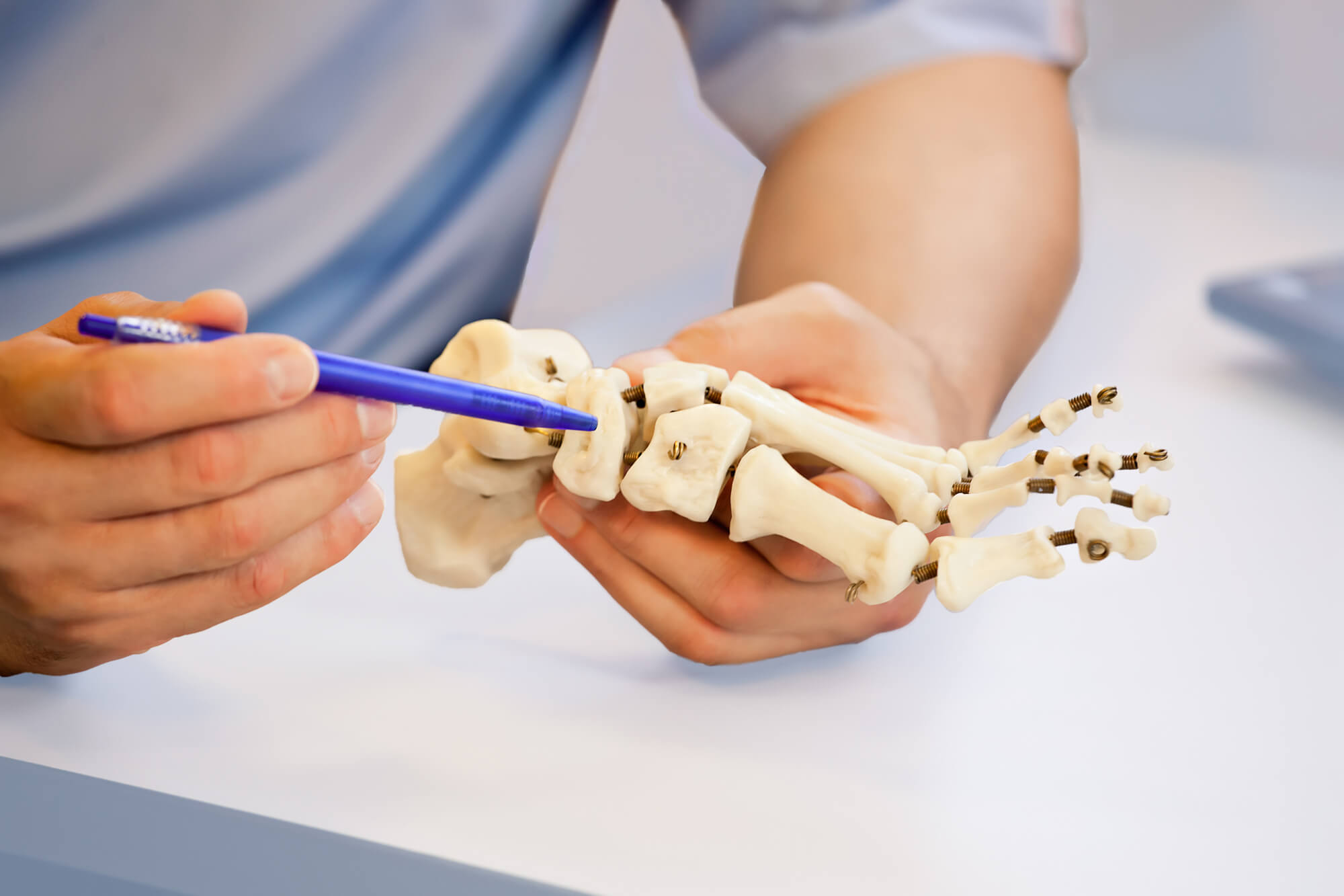 Doctor orthopedist examining feet