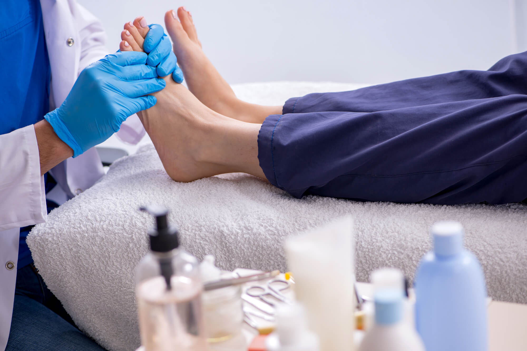 Podiatrist treating feet
