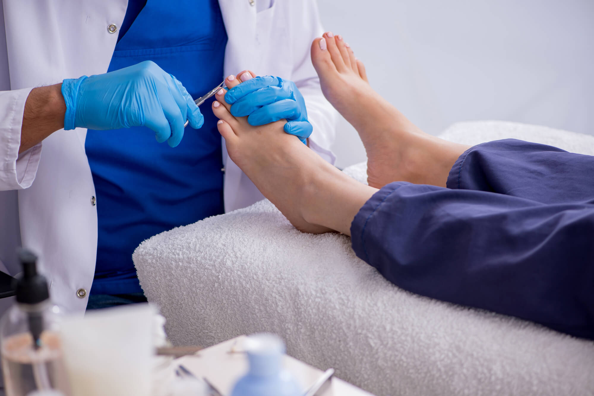 Podiatrist treating feet
